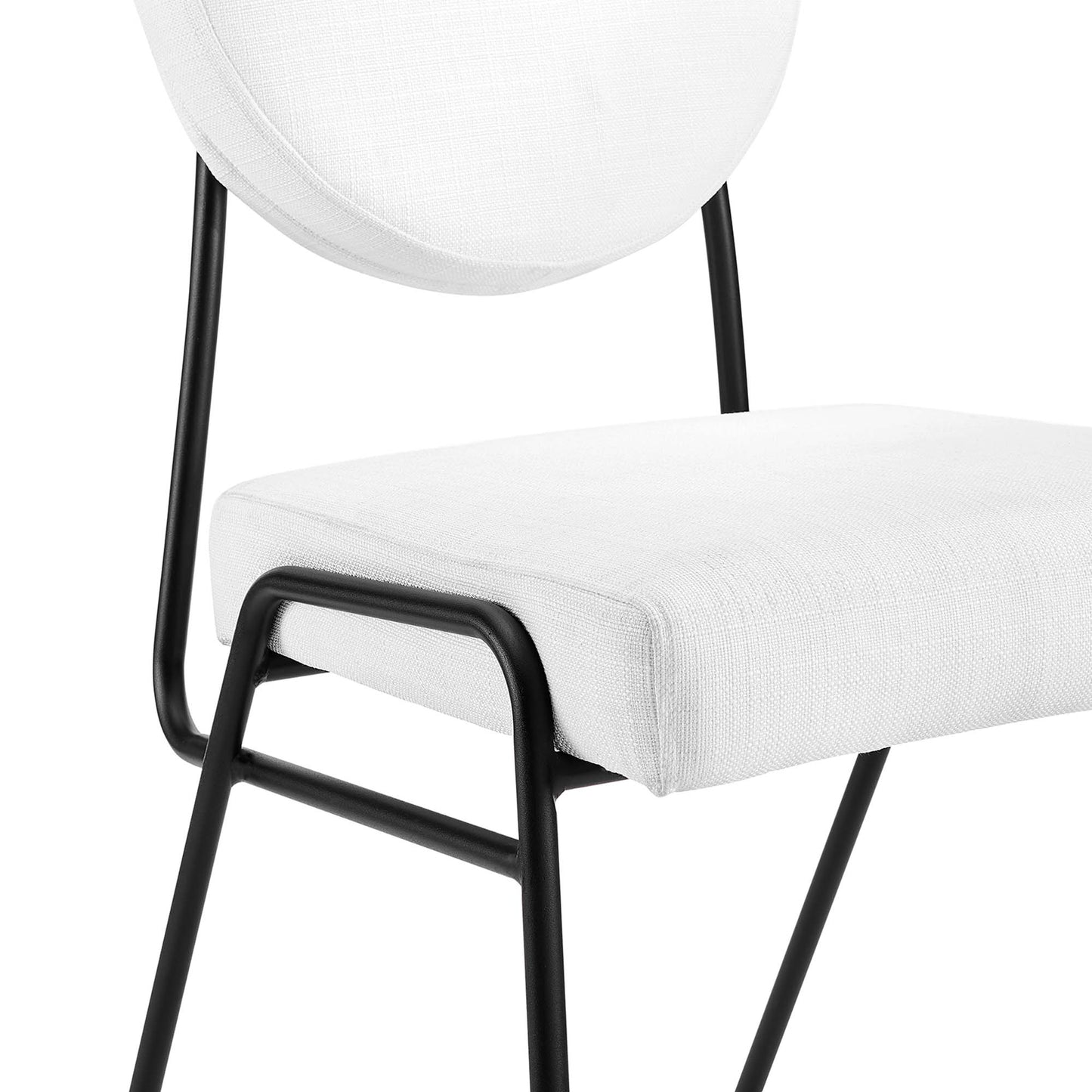 White fabric-upholstered dining side chairs (set of 2) with round backrests and cushioned seats on black metal frames.