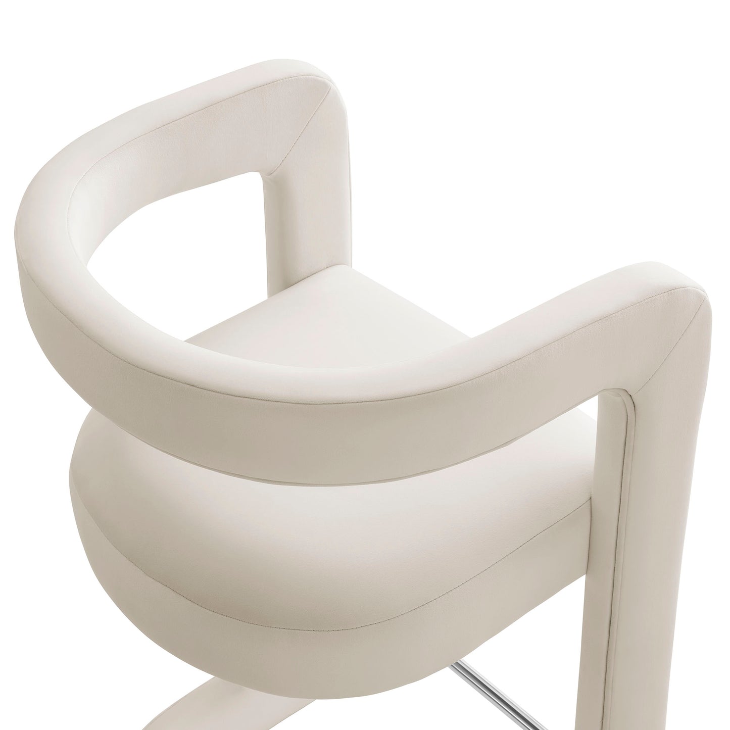 White curved counter stool with wraparound arms and a circular seat, velvet upholstery.