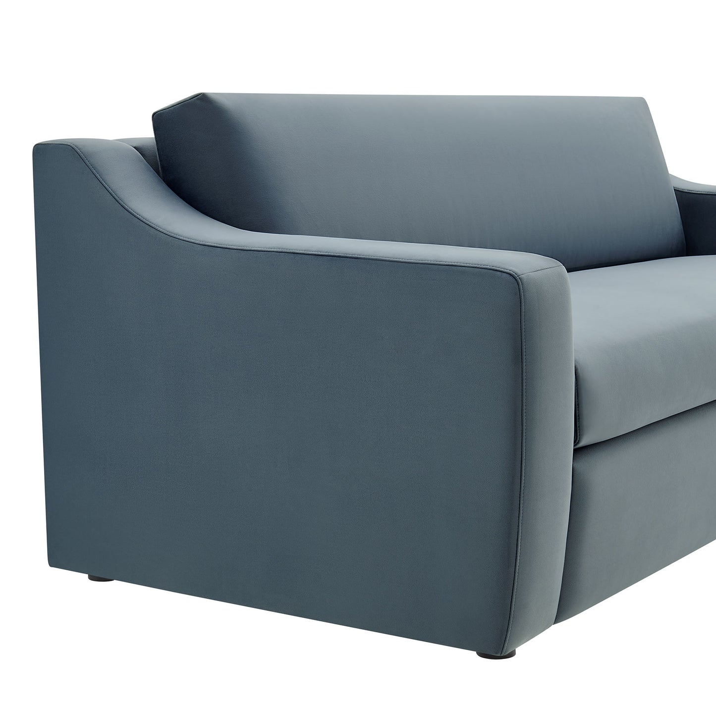 Blue velvet sofa with curved arms and clean cushions in a modern, compact design.