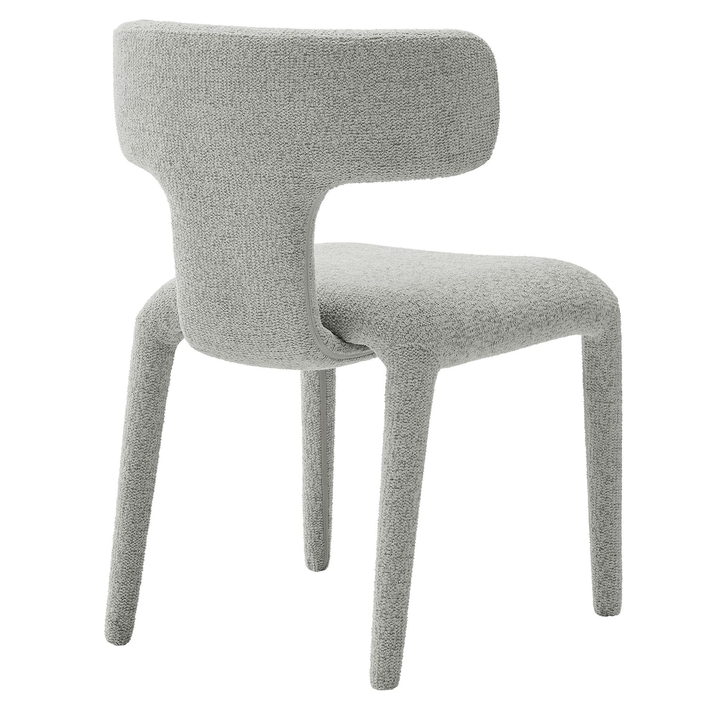 Grey boucle upholstered dining chair with curved back and four tapered legs.
