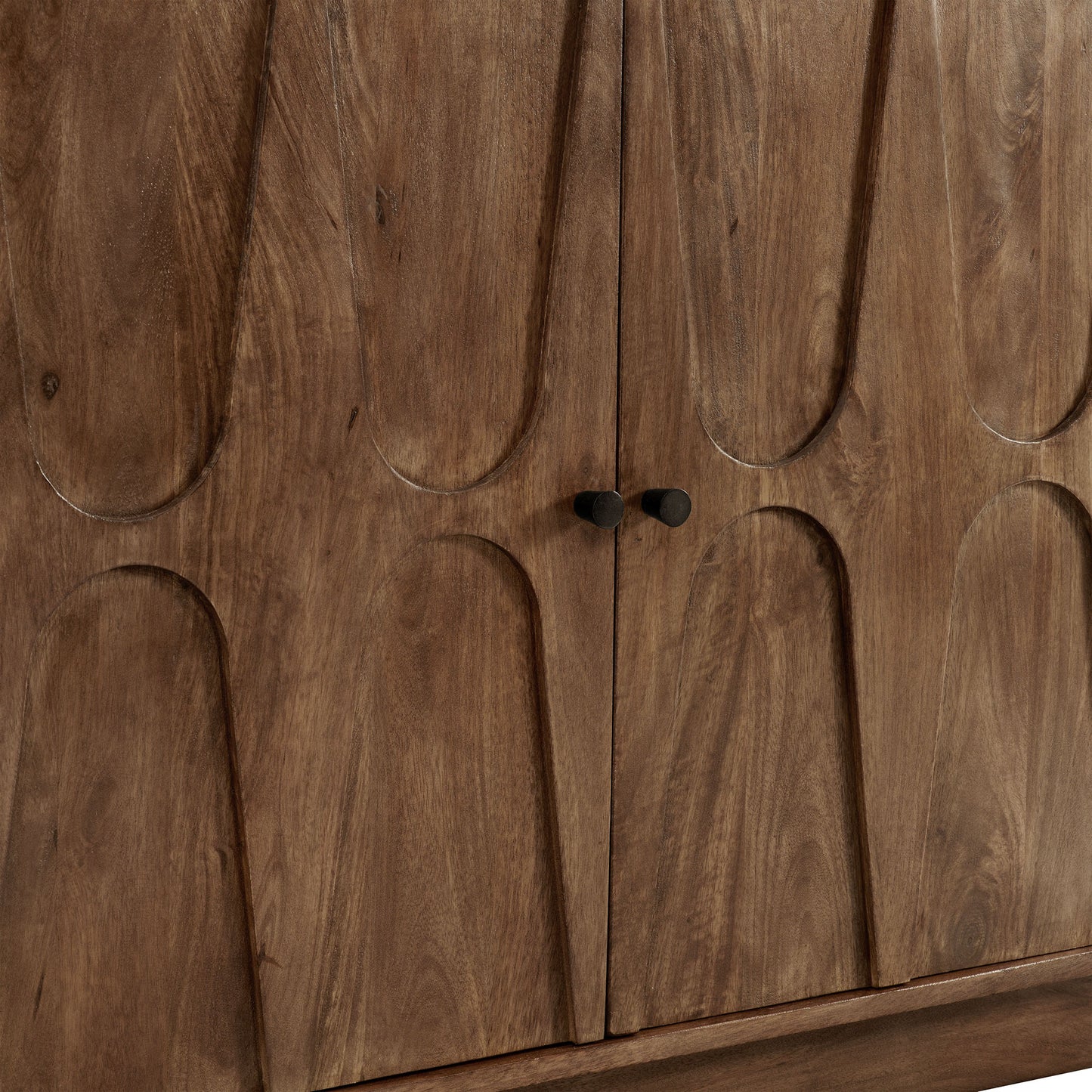 Mango wood sideboard cabinet with arched-panel doors, small dark knobs, brown wood grain.