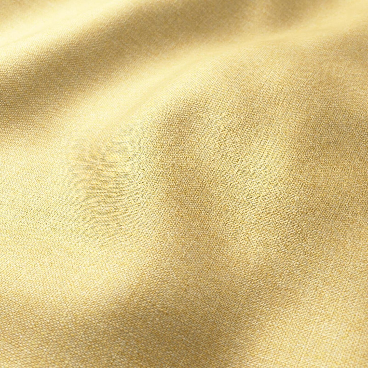 Pale golden-yellow woven fabric with visible texture and soft folds.