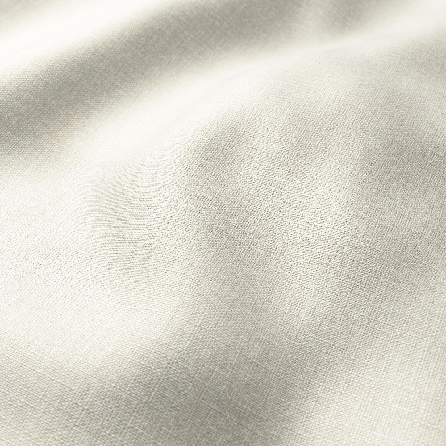 Cream linen-like fabric with a fine weave, soft drape and neutral cream/tan color, ideal for garments or home decor.
