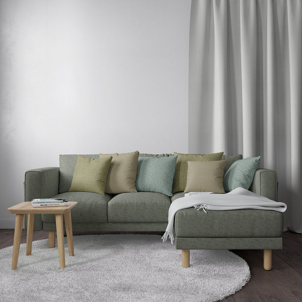 Green-gray solid fabric sample with a subtle woven texture.