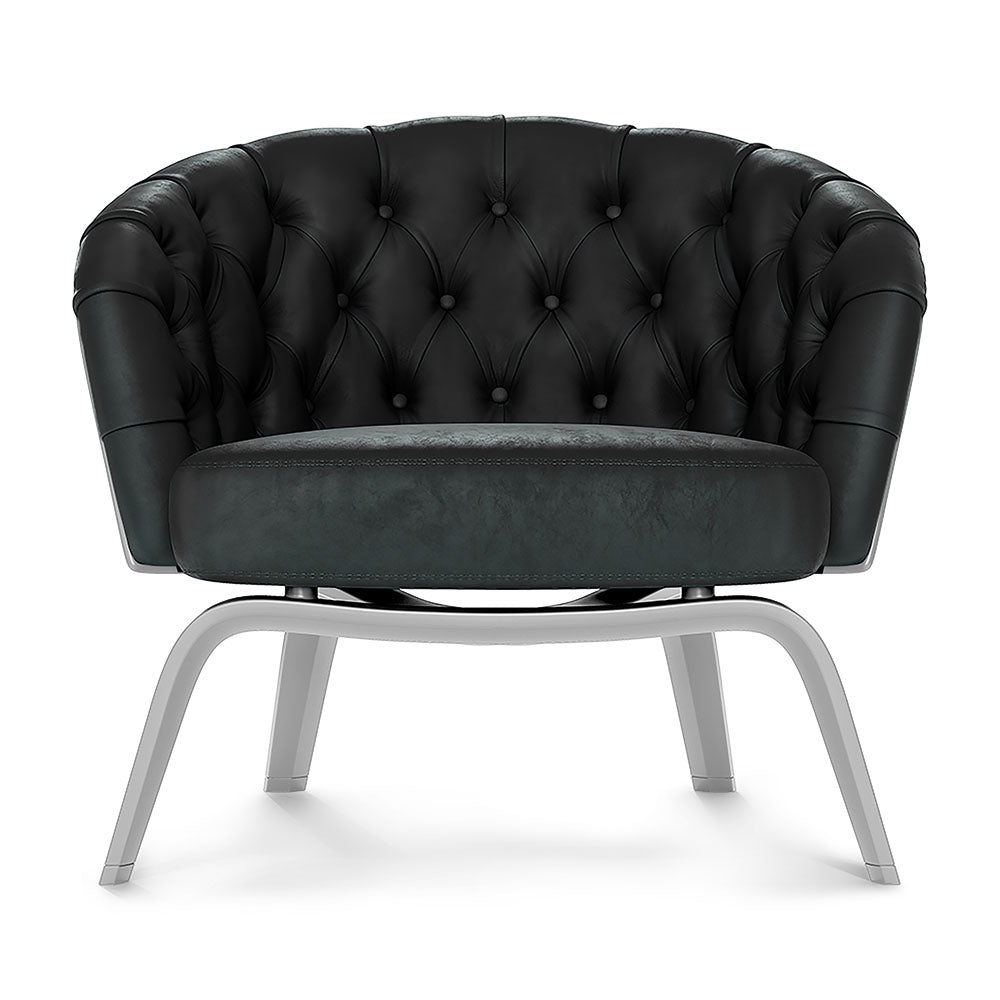Blue solid fabric lounge chair with tufted back, buttoned detailing, rounded arms, and curved metal legs; Chesterfield-style.