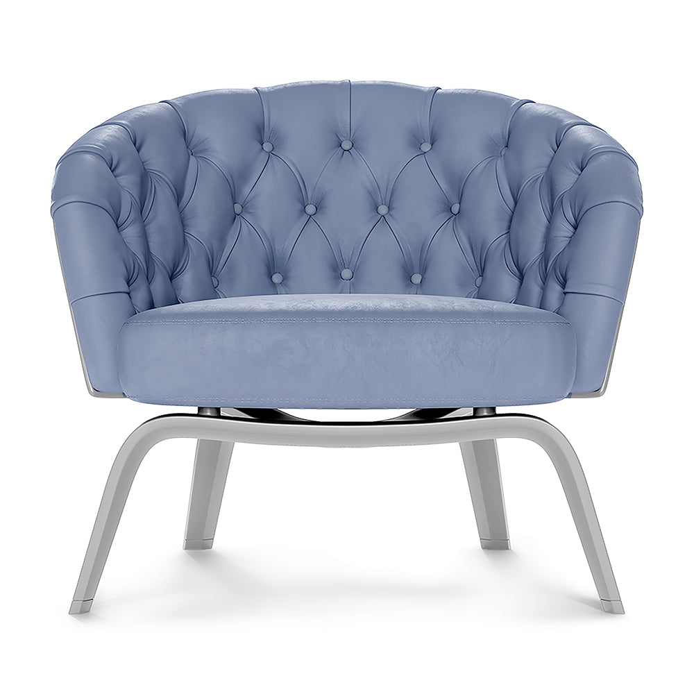 Dove solid fabric tufted barrel chair with button back, round metal base and curved gray metal legs for a modern lounge.