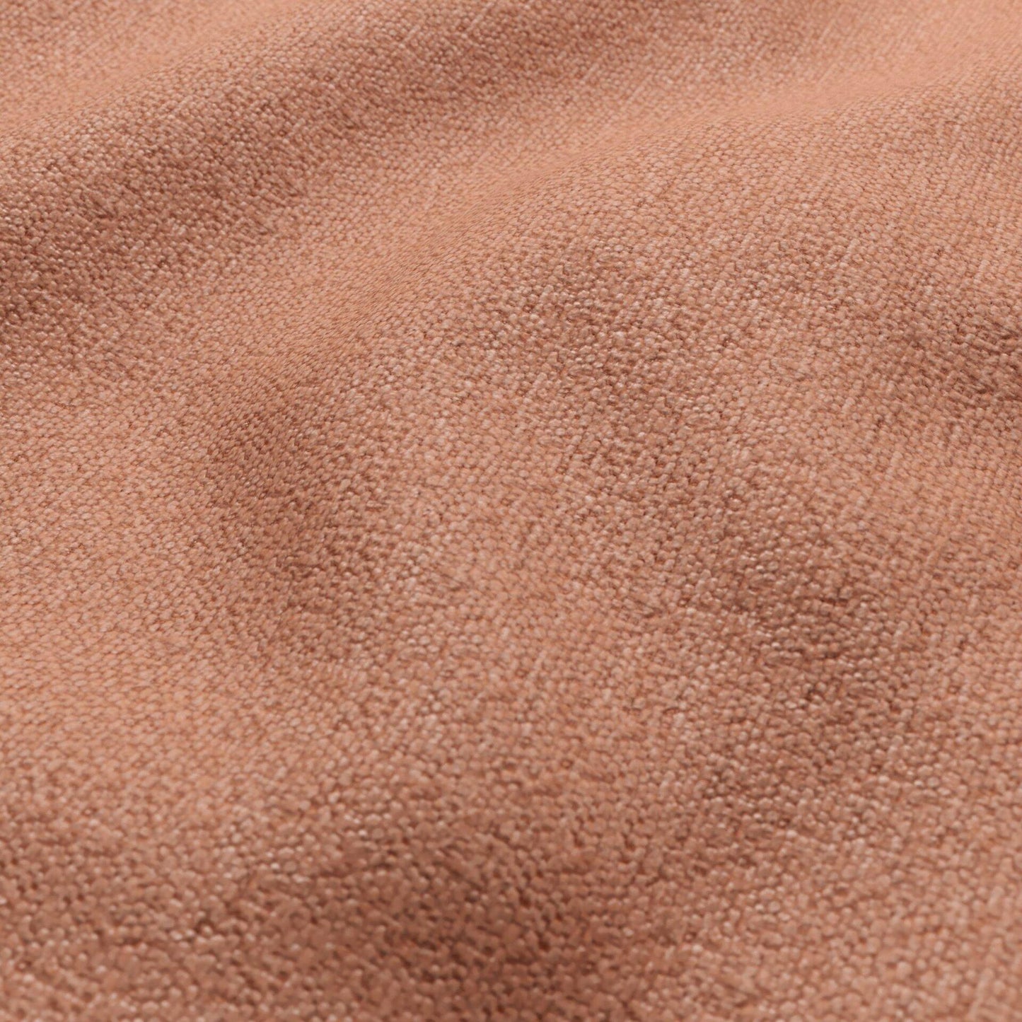 Close-up of pink outdoor chenille fabric with a soft nap and textured surface.