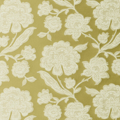 Elegant floral fabric with intricate white embroidery on a soft olive green background, perfect for upholstery or drapery.