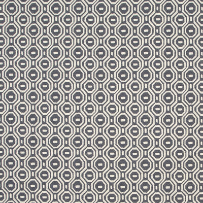 Geometric fabric in navy blue & cream, featuring a hexagonal pattern, perfect for upholstery or curtains.