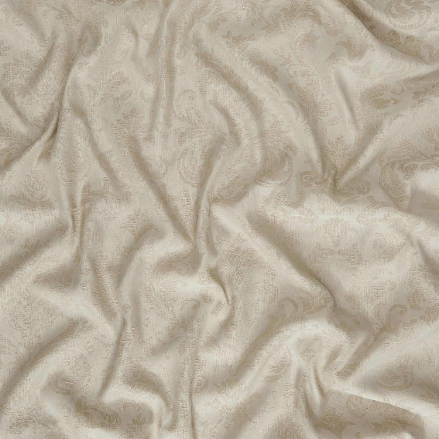 Cream-beige damask fabric with subtle floral scroll pattern, jacquard weave, sheer and soft sheen.