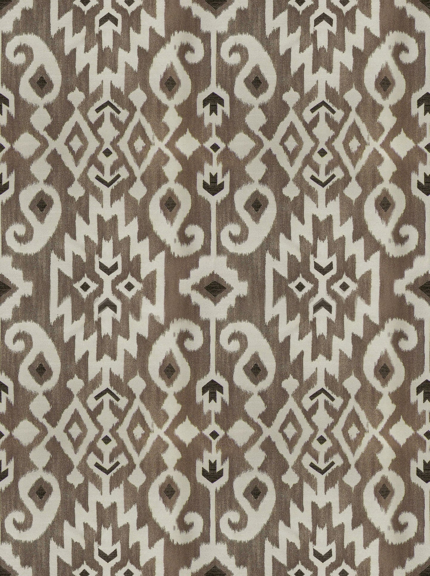 Brown & beige ikat-inspired geometric fabric pattern with diamond & scroll motifs for upholstery.