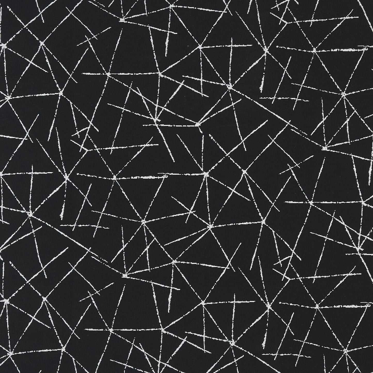 Charcoal gray fabric with white chalk-like fracture lines in an abstract geometric pattern.
