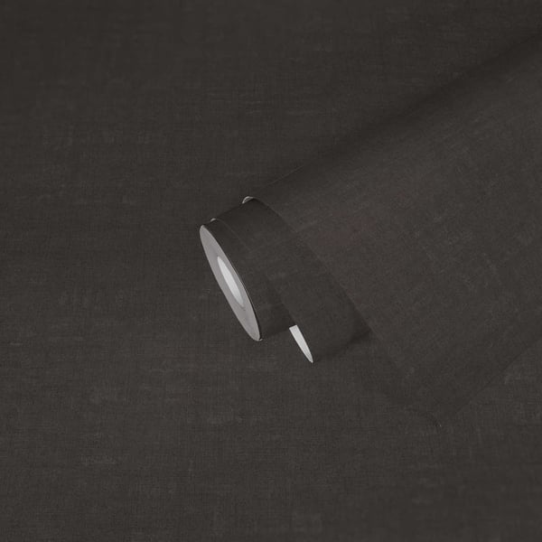 Dark charcoal linen fabric close-up with rolled edge and subtle texture, suitable for upholstery.