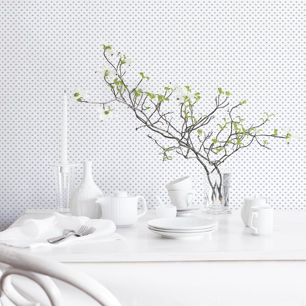 Blue Tri Leaf wallpaper pattern on a wall.