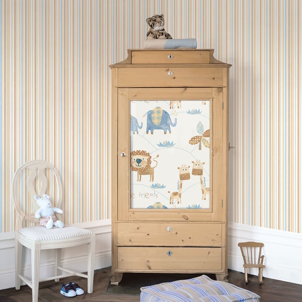 Beige and multi-color striped wallpaper in a nursery, with toys nearby.