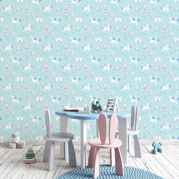 Pastel kids room with a round blue table, pink bunny-ear chair, gray chairs, wooden floor, and unicorn wallpaper.