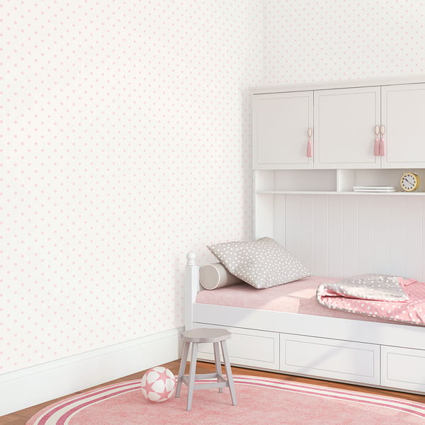 White kids daybed with pink dotted bedding, pastel wallpaper, built-in drawers and shelves, small stool and pink ball.