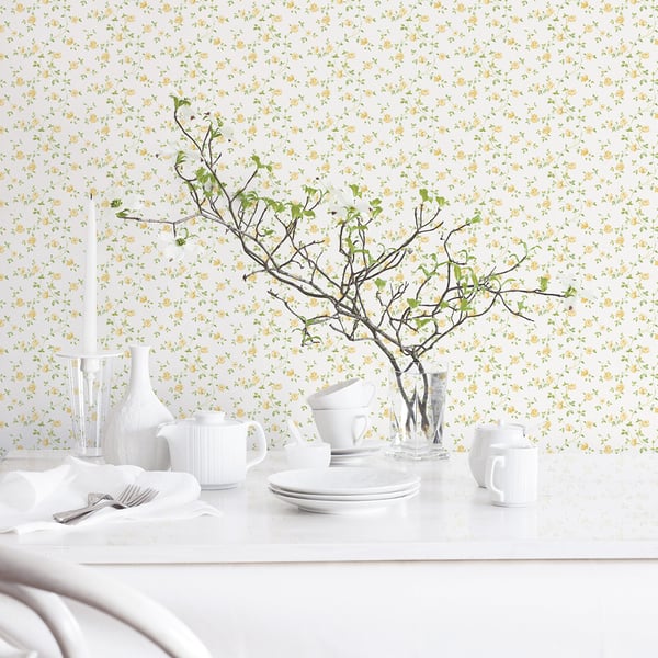 Cream wallpaper featuring a rose trellis pattern.