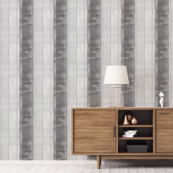 Black striped wallpaper on the wall.