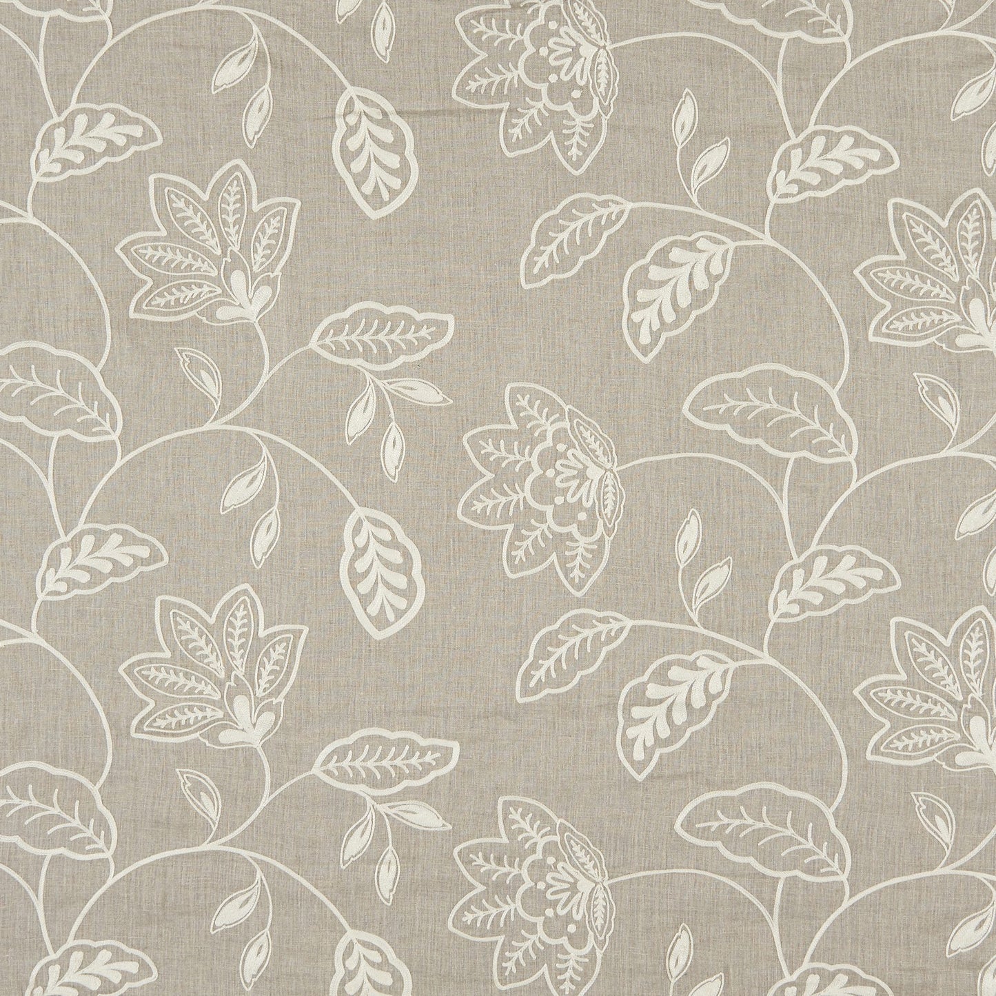Beige linen-textured fabric with white botanical vines & blossoms embroidery; timeless textile.