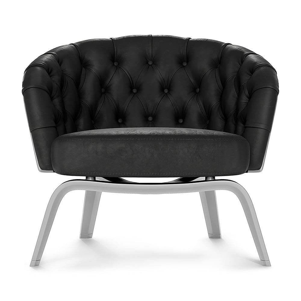 Black tufted textured fabric lounge chair with curved silver metal legs and diamond button stitching.