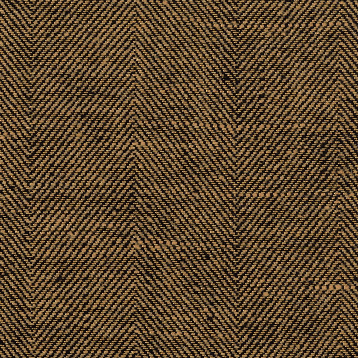 Gold-toned herringbone tweed wool fabric close-up; textured fabric suitable for jackets and coats.