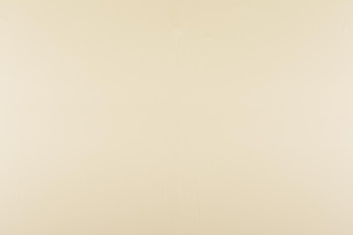 Creme fabric swatch with subtle texture.