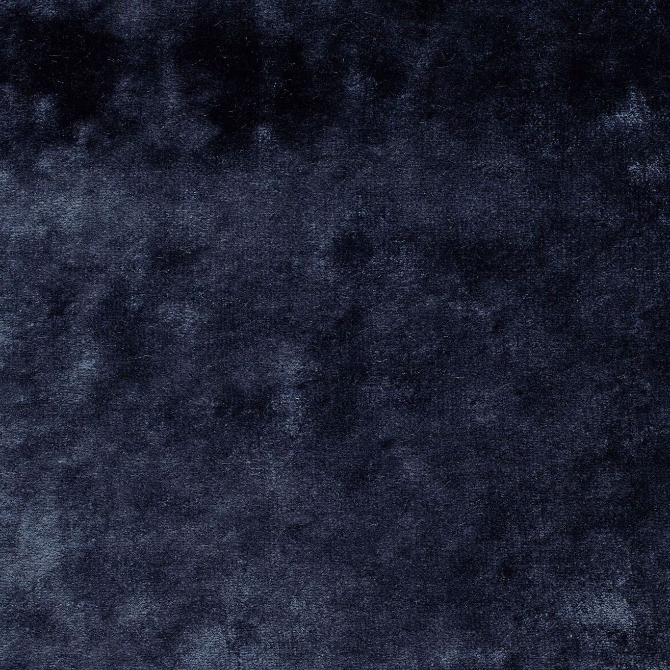 Deep navy velvet fabric swatch with plush pile and subtle sheen.