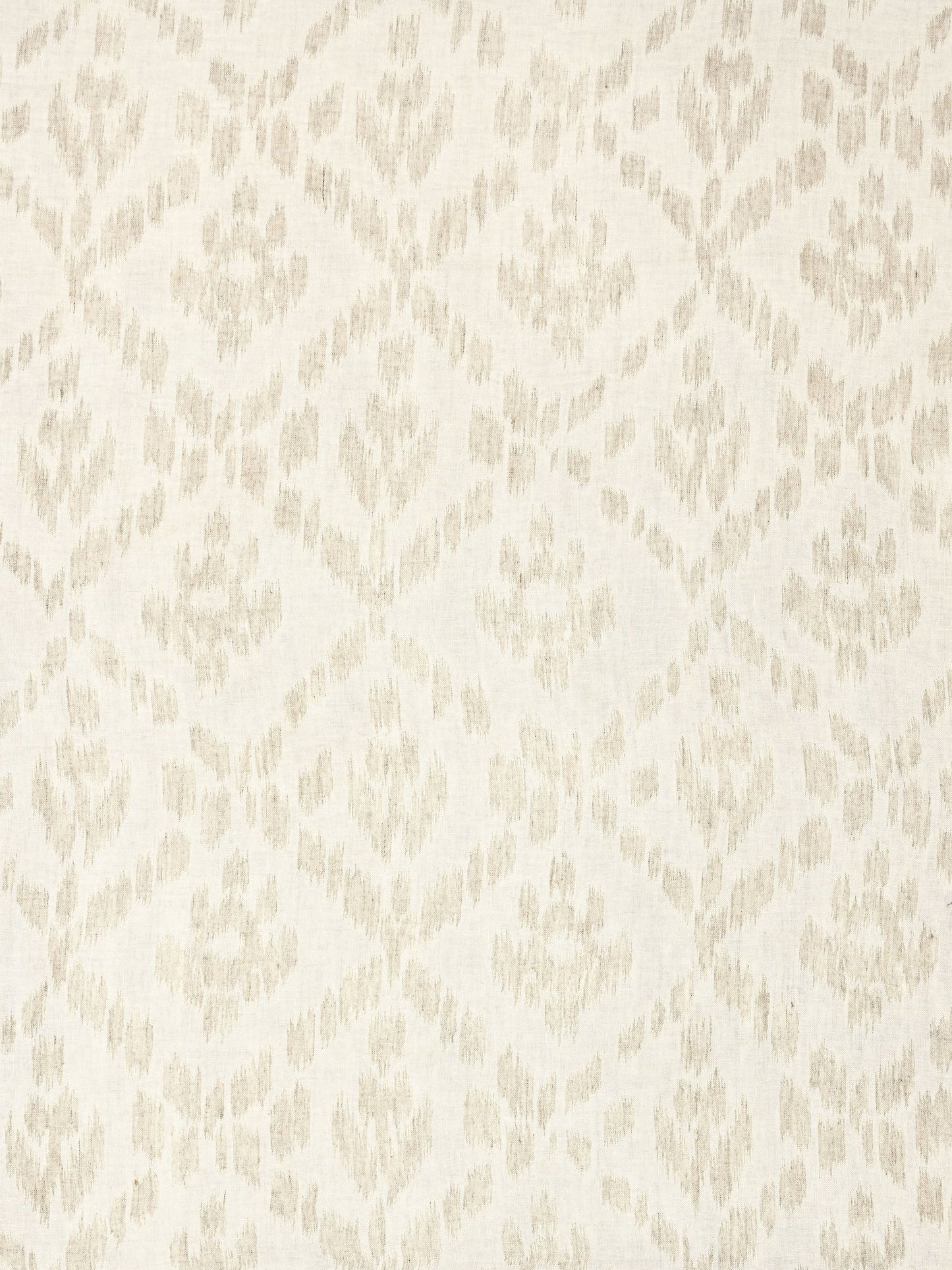 Ivory fabric with a soft beige ikat-inspired diamond damask pattern.