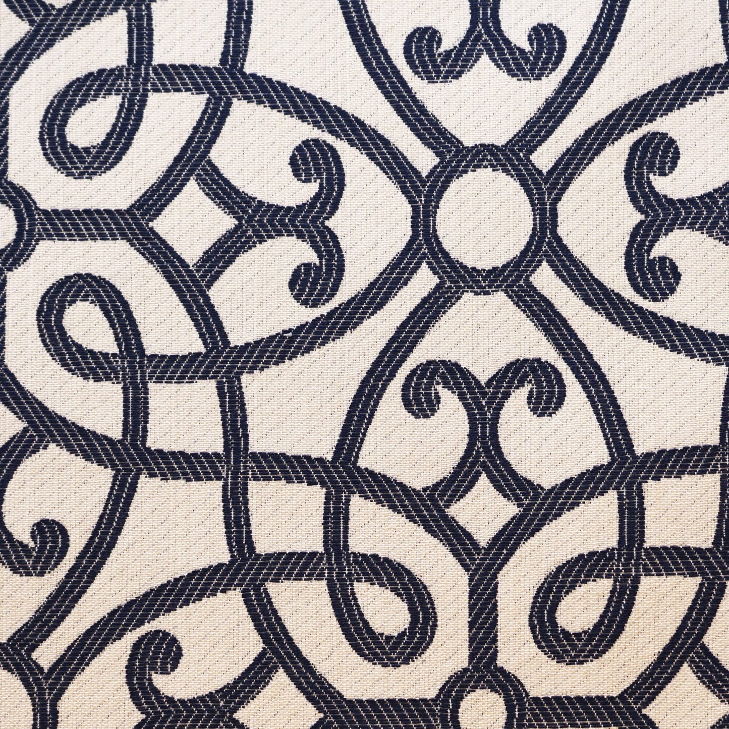 Blue damask scroll jacquard fabric with a textured surface for upholstery.