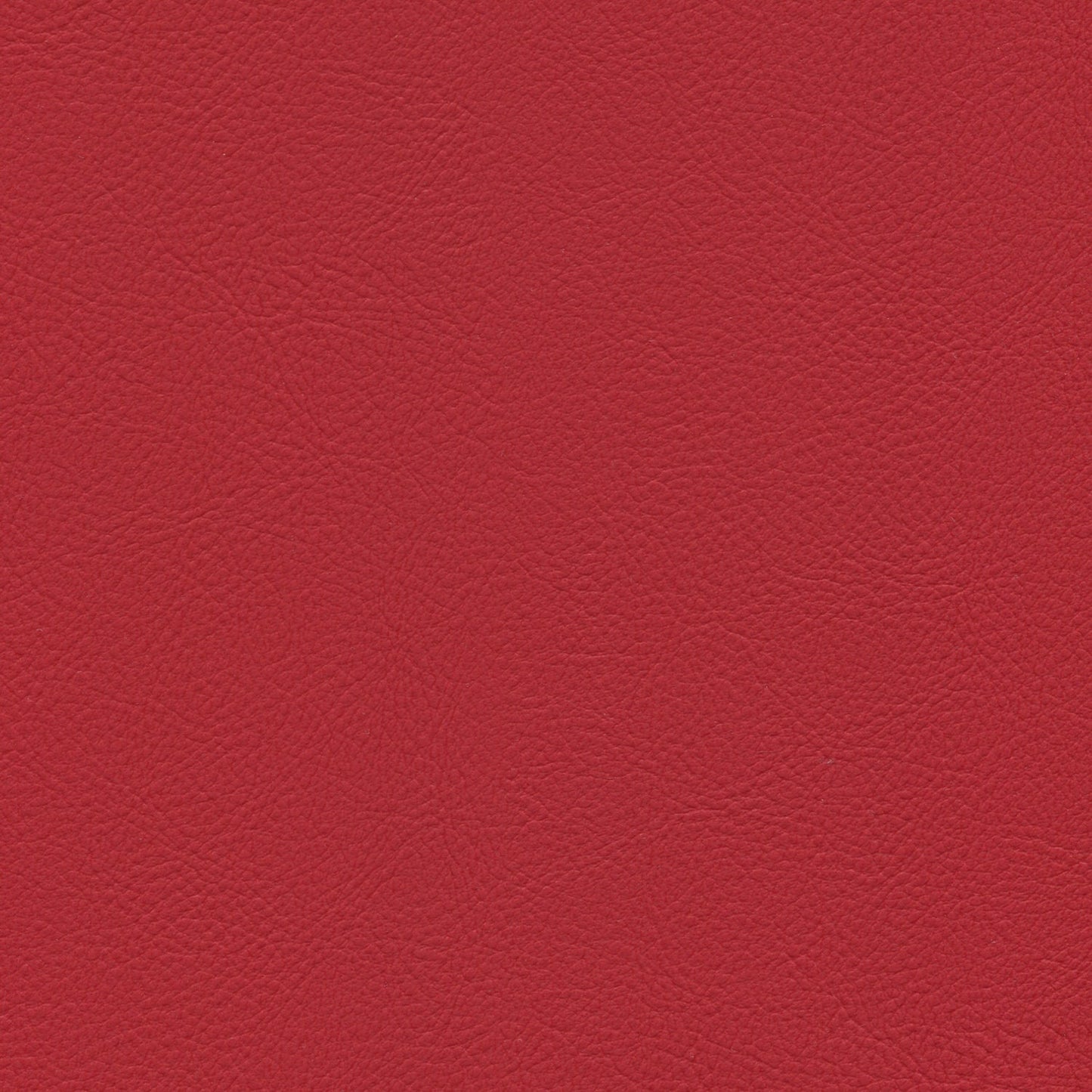 Torch red leather texture close-up with natural grain.