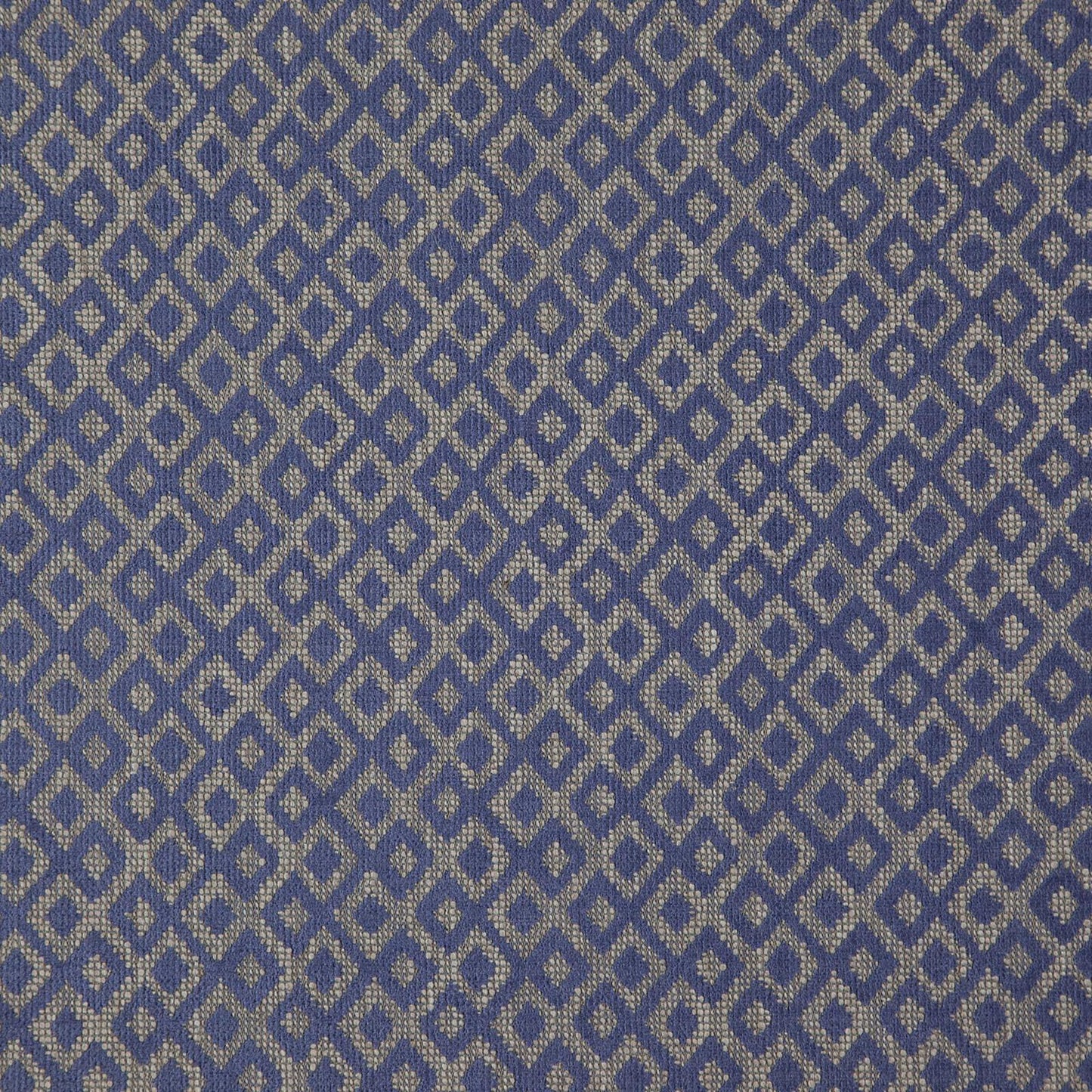 Blue woven fabric with beige diamond lattice pattern; geometric upholstery textile.