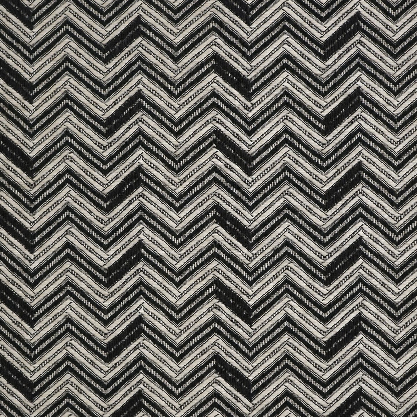 Grey & silver chevron-patterned jacquard-woven fabric with bold zigzag stripes.