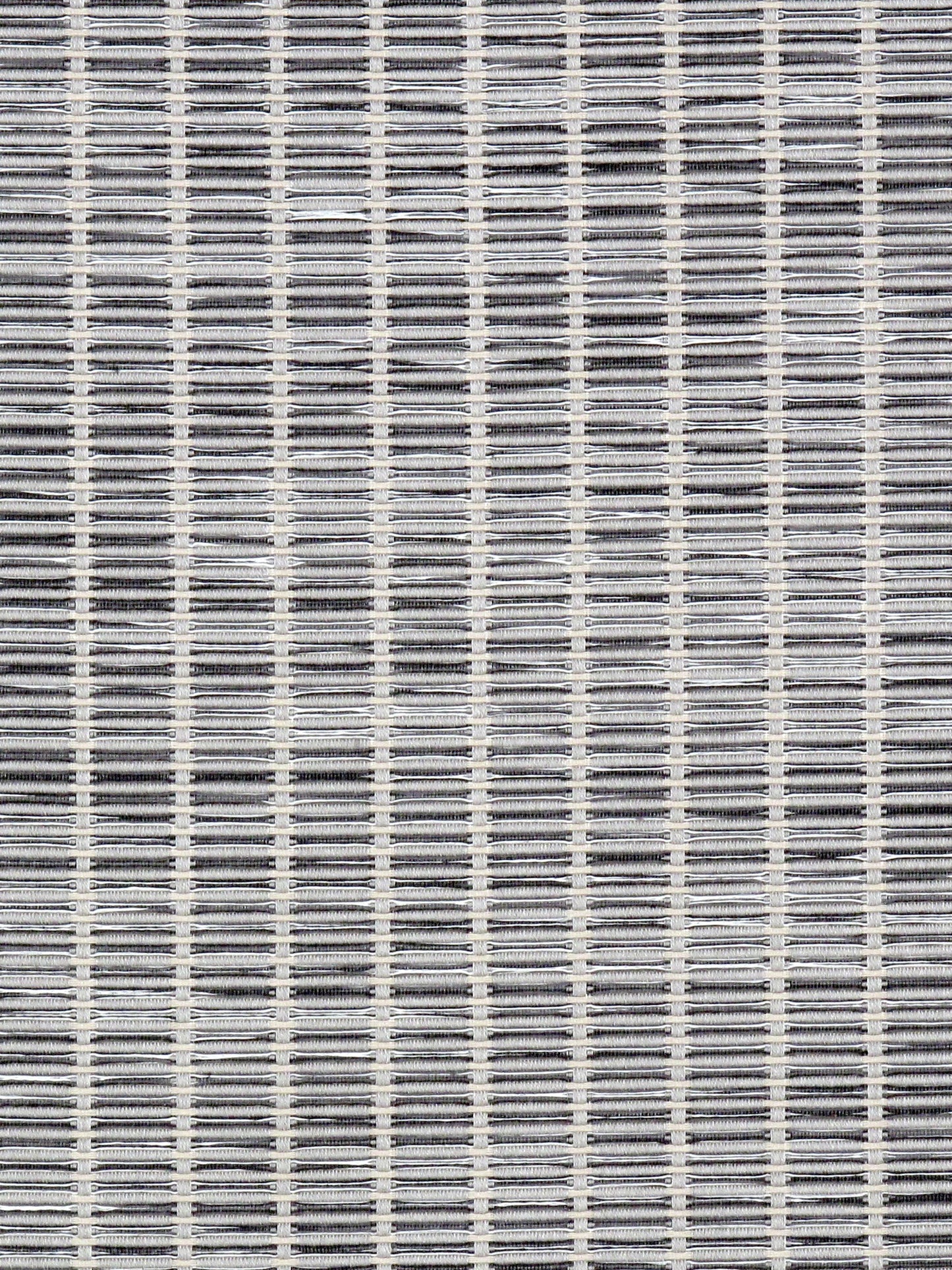 Close-up of woven fabric with light beige and dark gray threads forming a subtle grid pattern.