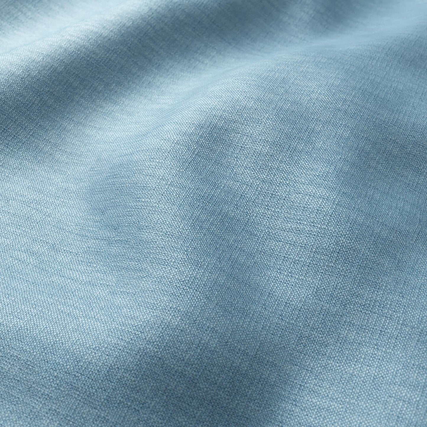 Light blue woven fabric with a soft texture and gentle folds.
