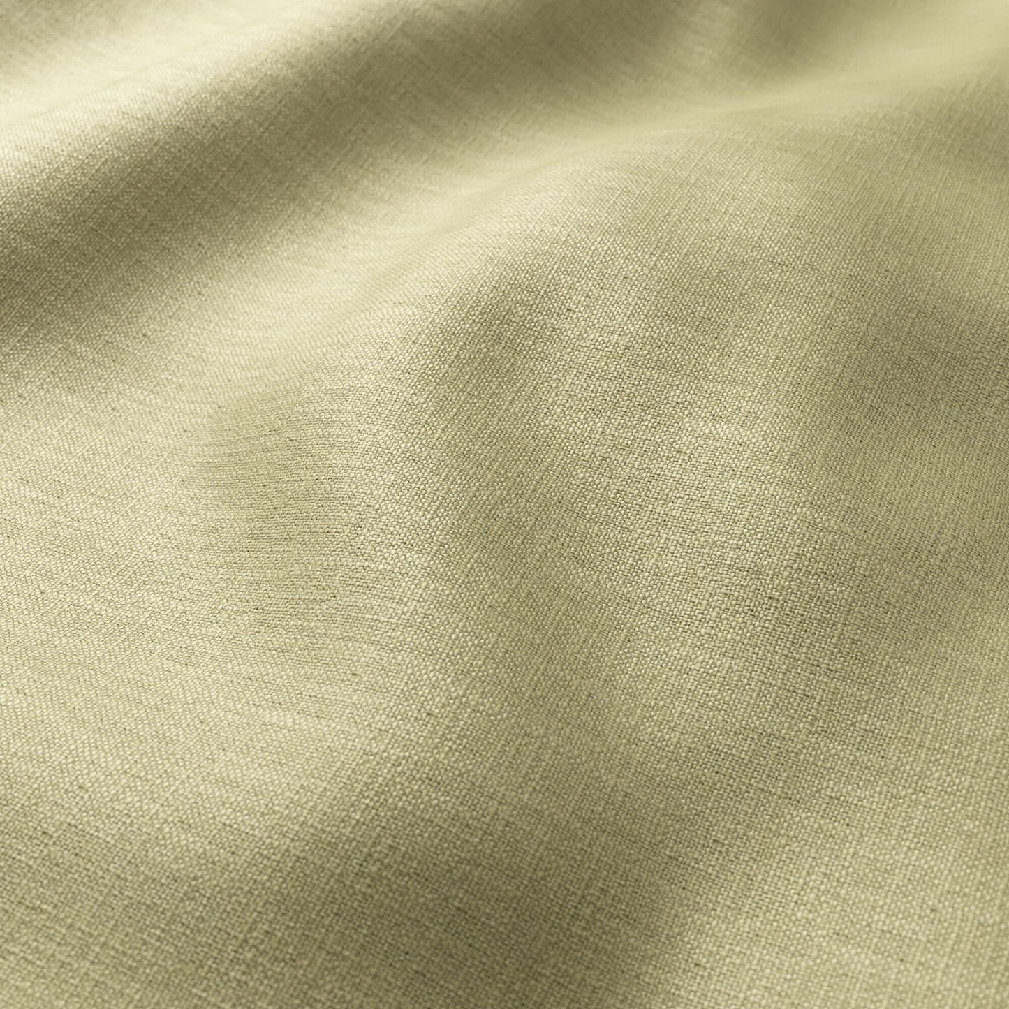 Green khaki linen-texture fabric close-up with visible weave and soft, flowing folds.