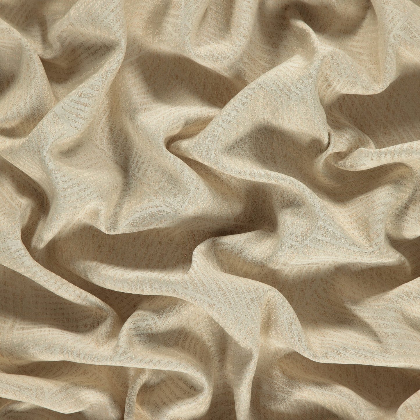 Cream beige fabric with subtle woven pattern, soft drapes and folds.