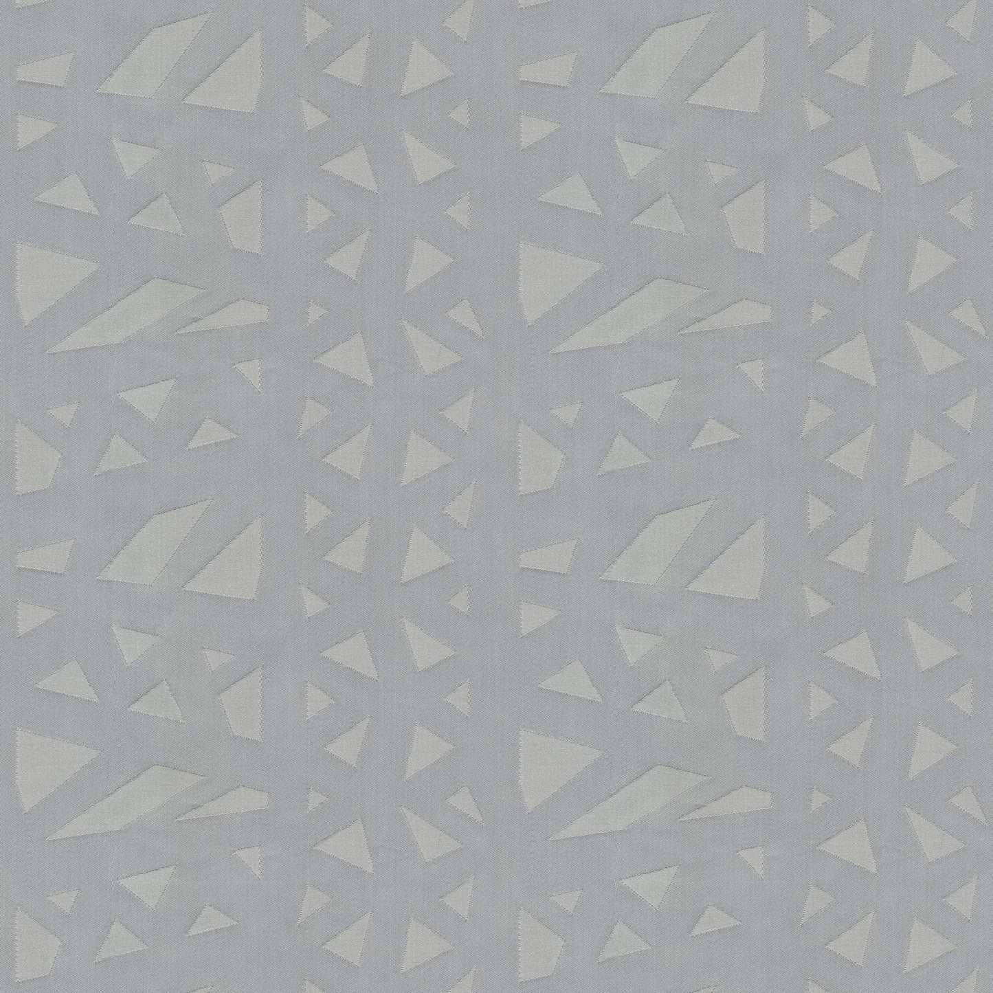 Light gray fabric with scattered pale white triangle geometric pattern; modern abstract textile for decor.