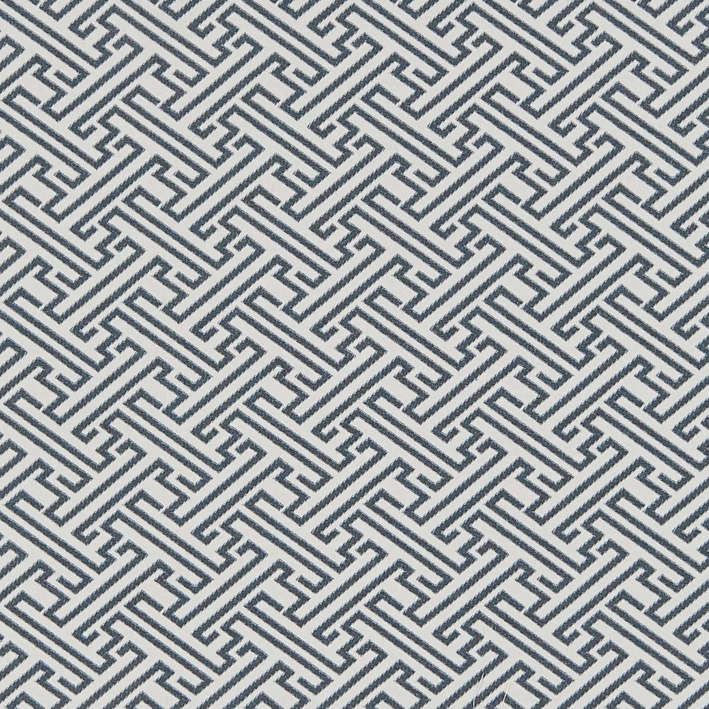 Blue Greek key meander geometric jacquard fabric with interlocking lines, repeating pattern.