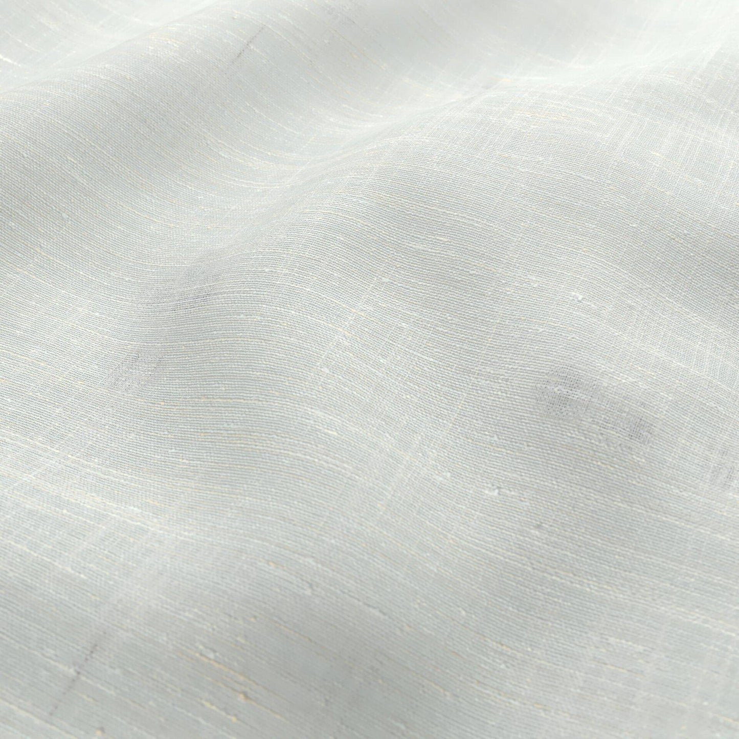 Cream sheer woven fabric with a linen-like texture, subtle gold threads and a soft drape; ideal for curtains or lightweight garments.