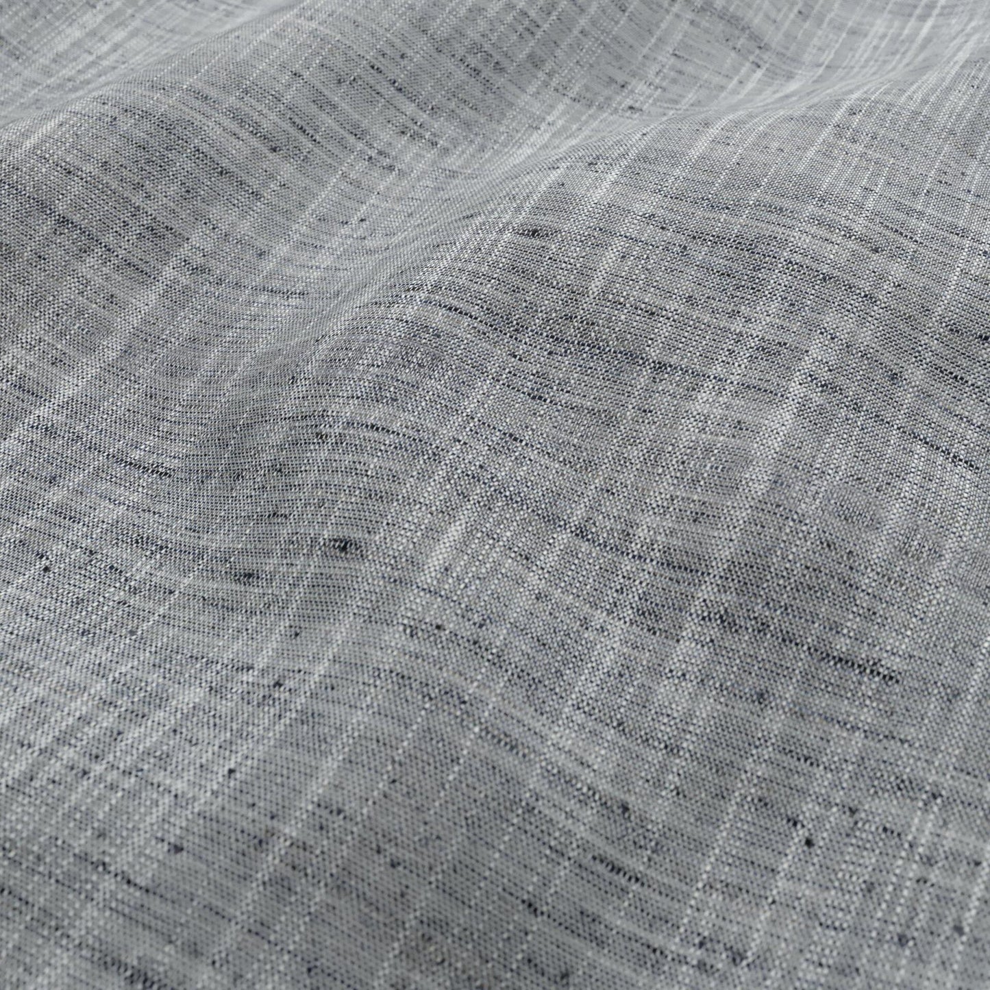Close-up of light gray linen-like fabric with a woven crosshatch pattern and soft drape.