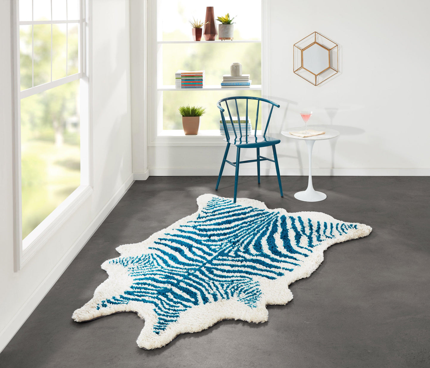 Momeni Kalahari blue 8x10 animal print area rug sold by Primoends, zebra-inspired contemporary indoor rug with plush synthetic fibers for living room and bedroom decor
