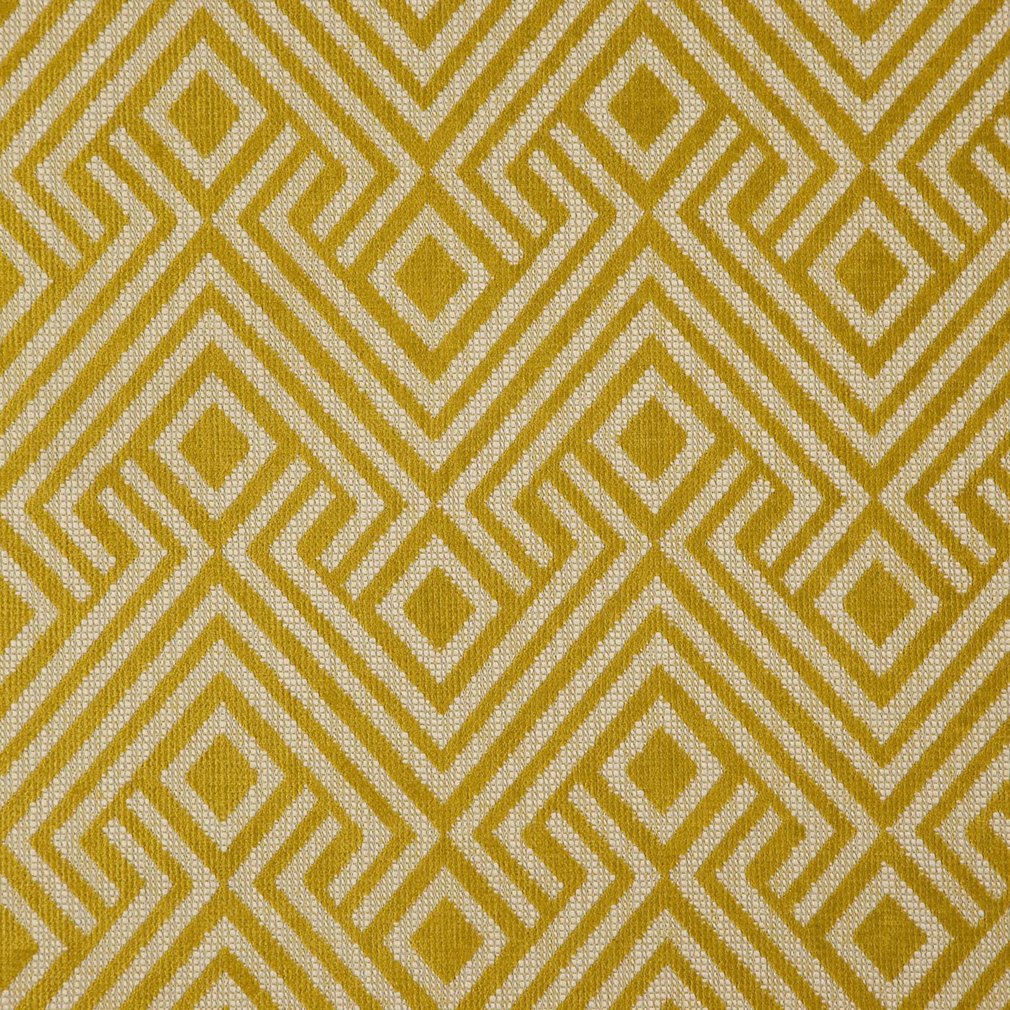 Yellow-gold and cream geometric lattice fabric with diamond motifs; woven upholstery style.