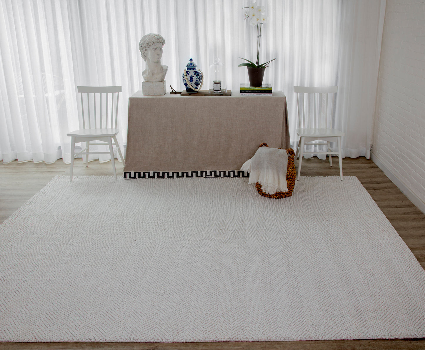 Beige runner rug on the floor in a neutrally styled room; other decor and furnishings barely visible around the edges.