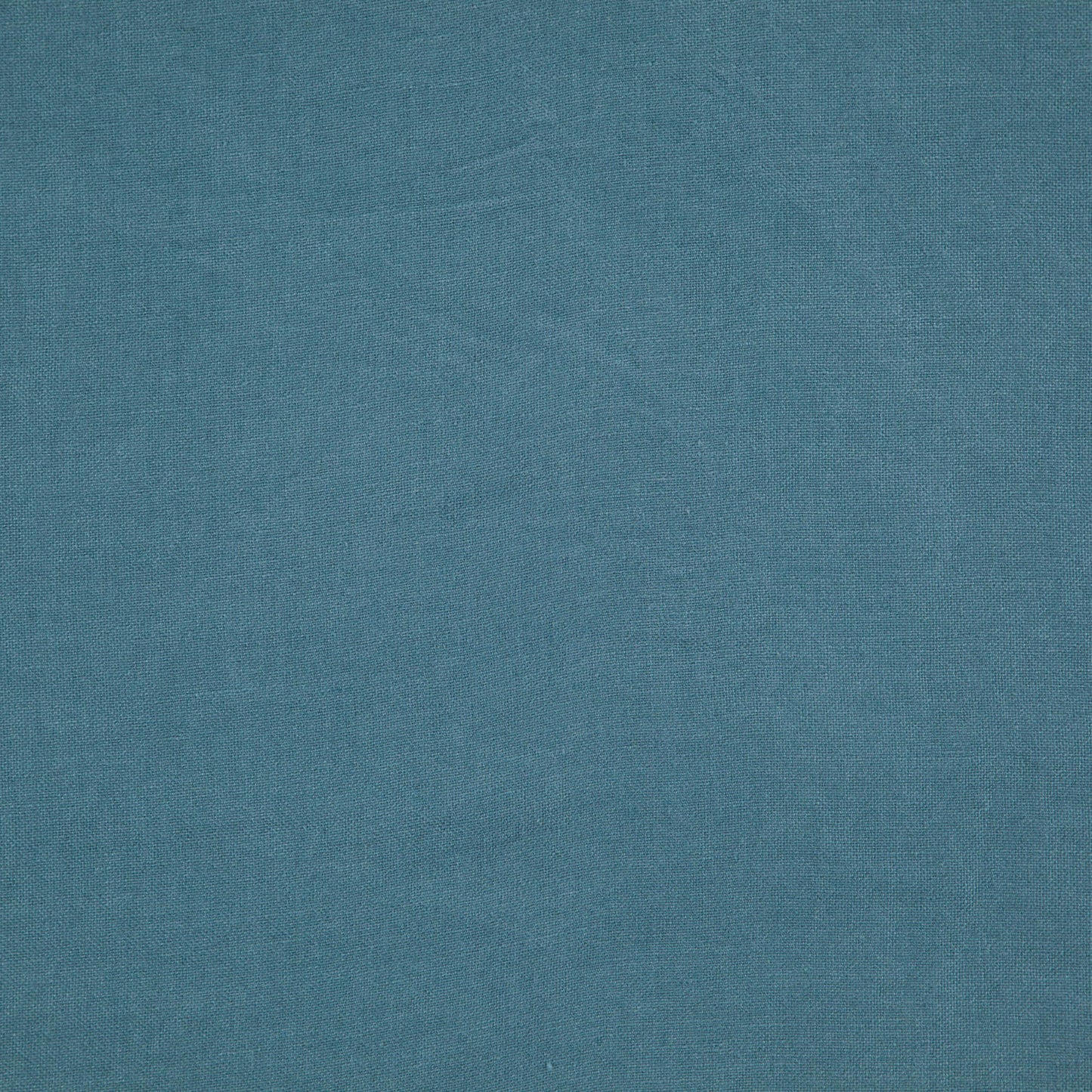 Blue linen-textured fabric swatch with subtle weave and matte finish.