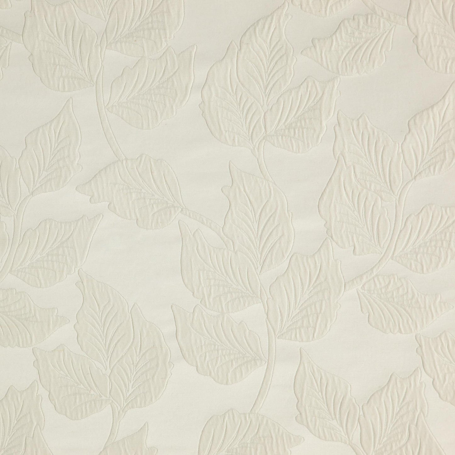 Cream embossed fabric with a raised leaf and vine botanical jacquard motif for a subtle textured look.