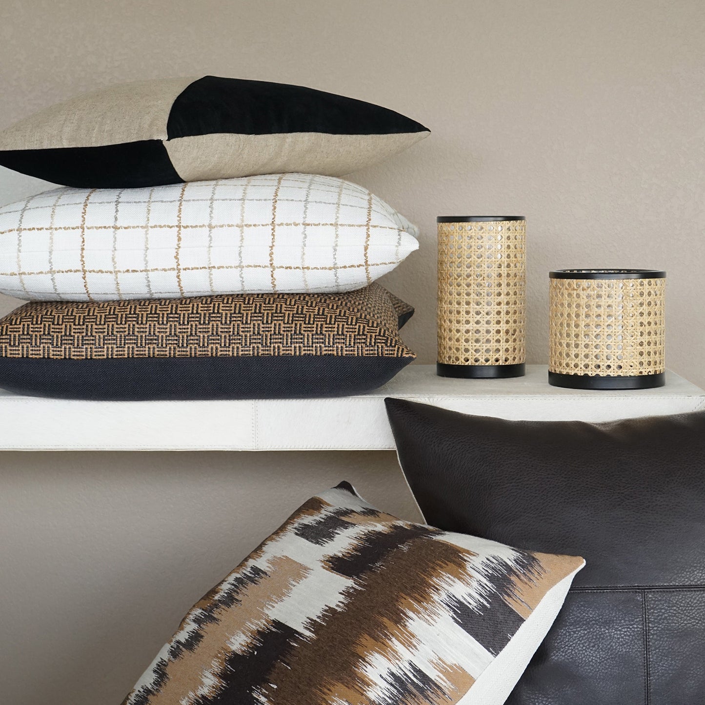 Black color-block lumbar pillow, 14x24 inches.