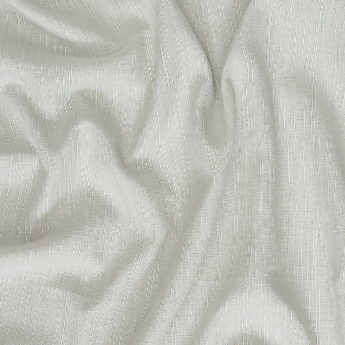 Green sheer jacquard fabric with soft drape and subtle texture; ideal for curtains or lightweight apparel.