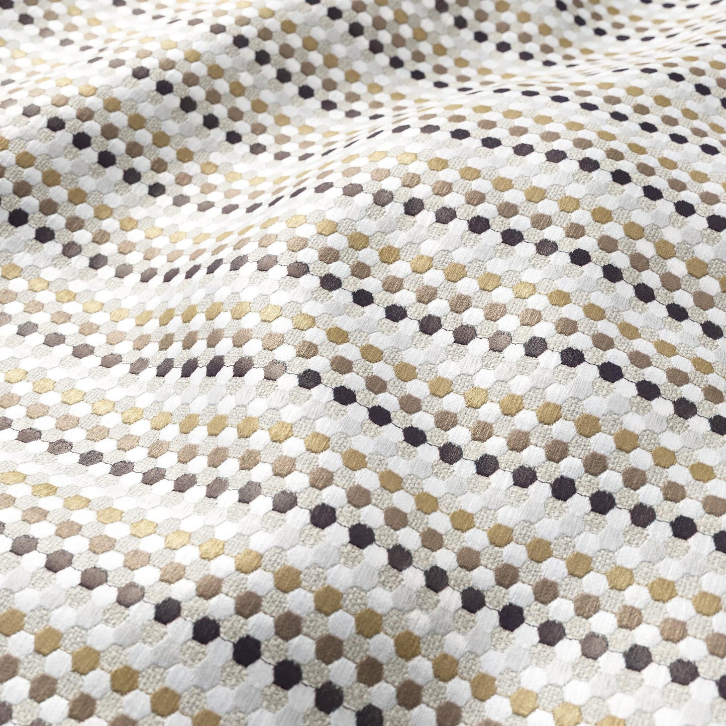 Textured woven fabric with grey & taupe geometric hex-dot pattern and subtle embroidery detail.