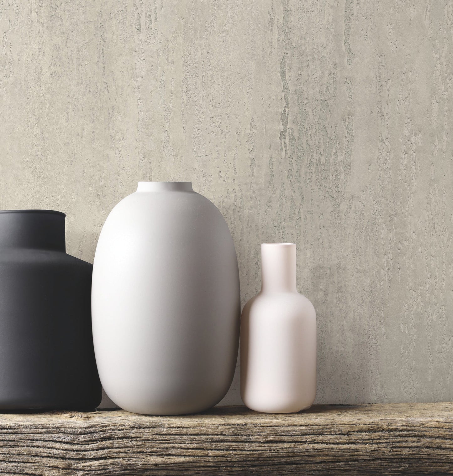 Warm grey stucco-style wallpaper with a subtle textured finish and architectural grey tones.